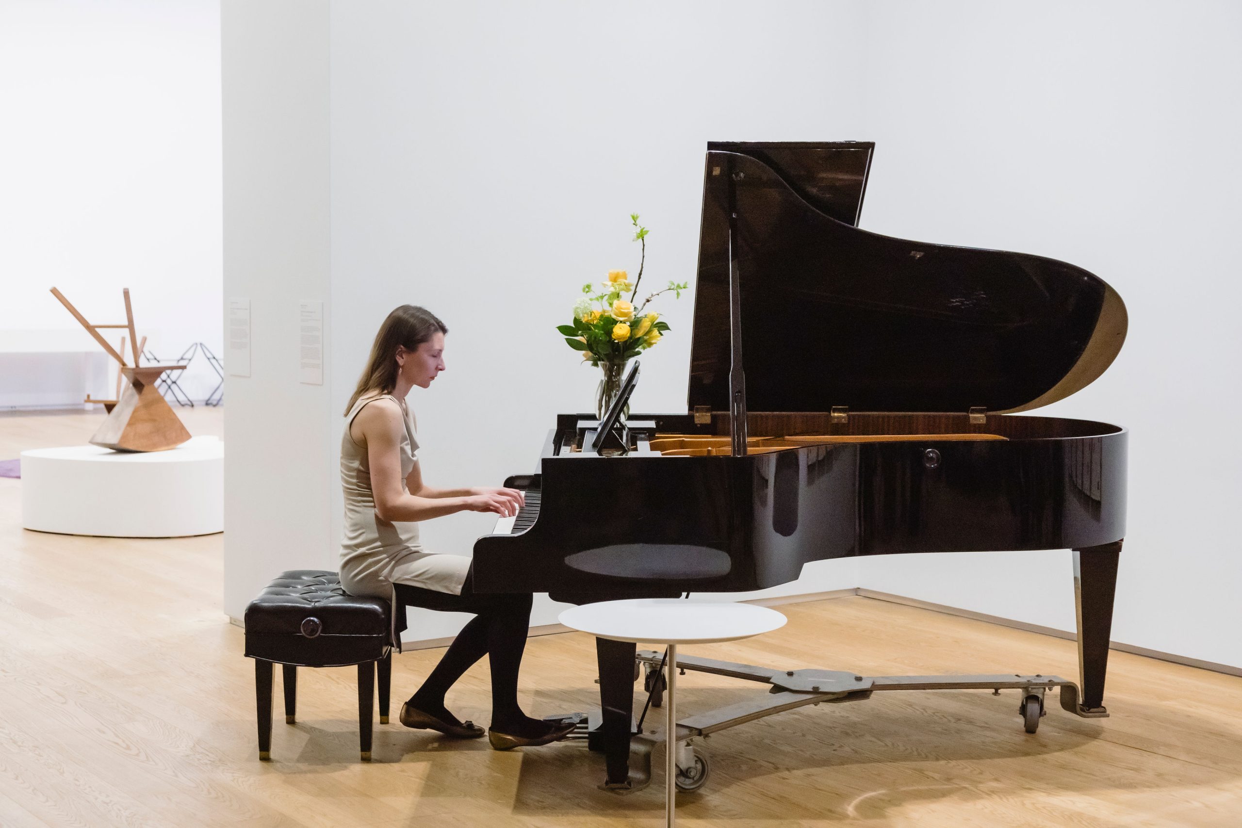 Sofia Mycyk performs live on a grand piano at Remai Modern
