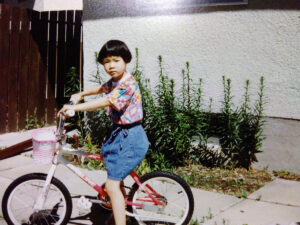 "My face may not show it in this photo, but I've always loved biking"