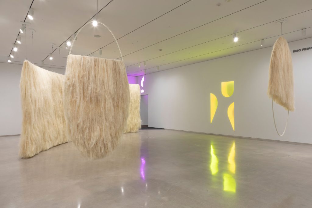 Large hanging sculptures made with sisal fibre are displayed in Remai Modern's Marquee Gallery.